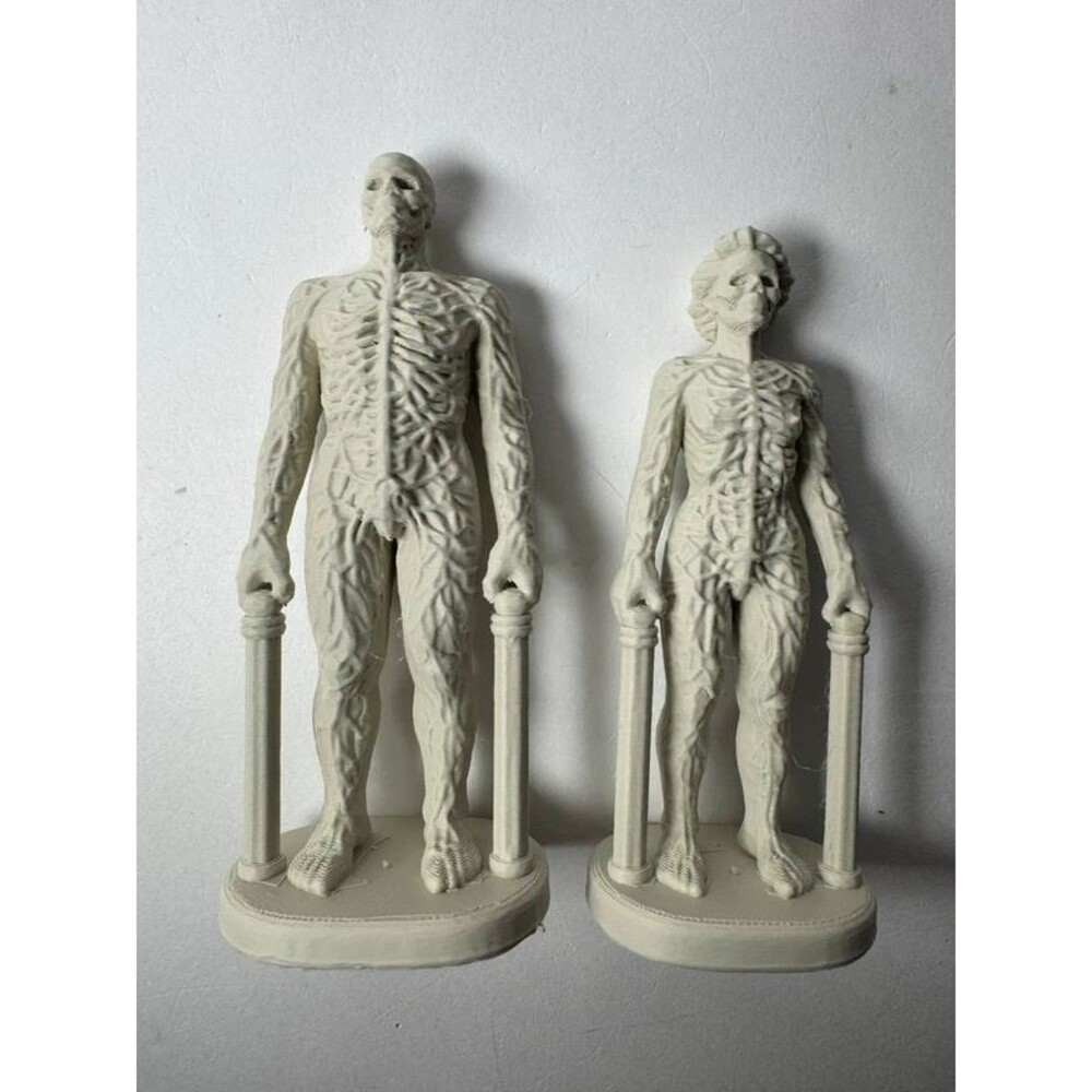 This island Earth 1955 transformation toy set of two